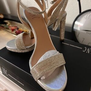 Tiny rhinestones complete the Daivi sandals